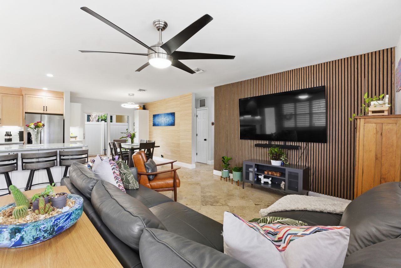 Open-concept living and dining area with modern furnishings